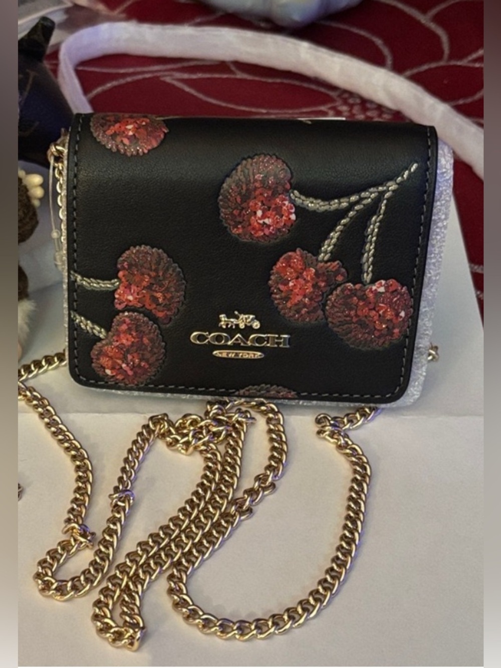 Coach Black Crossbody Bag with Red Sequin Cherry Motif